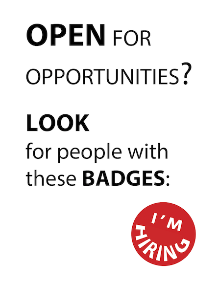 Sign for job seekers explaining how to recognize a red ‘I’m hiring’ badge.
