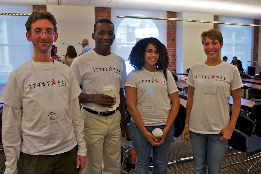 Summit participants wearing the OLPC T-shirt design.